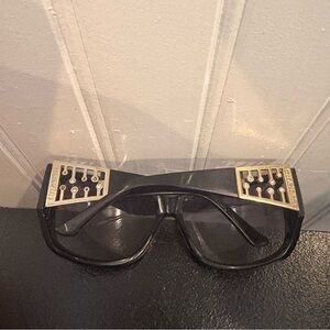 Vintage Rare black Chanel sunglasses with gold-tone decorative embellishment